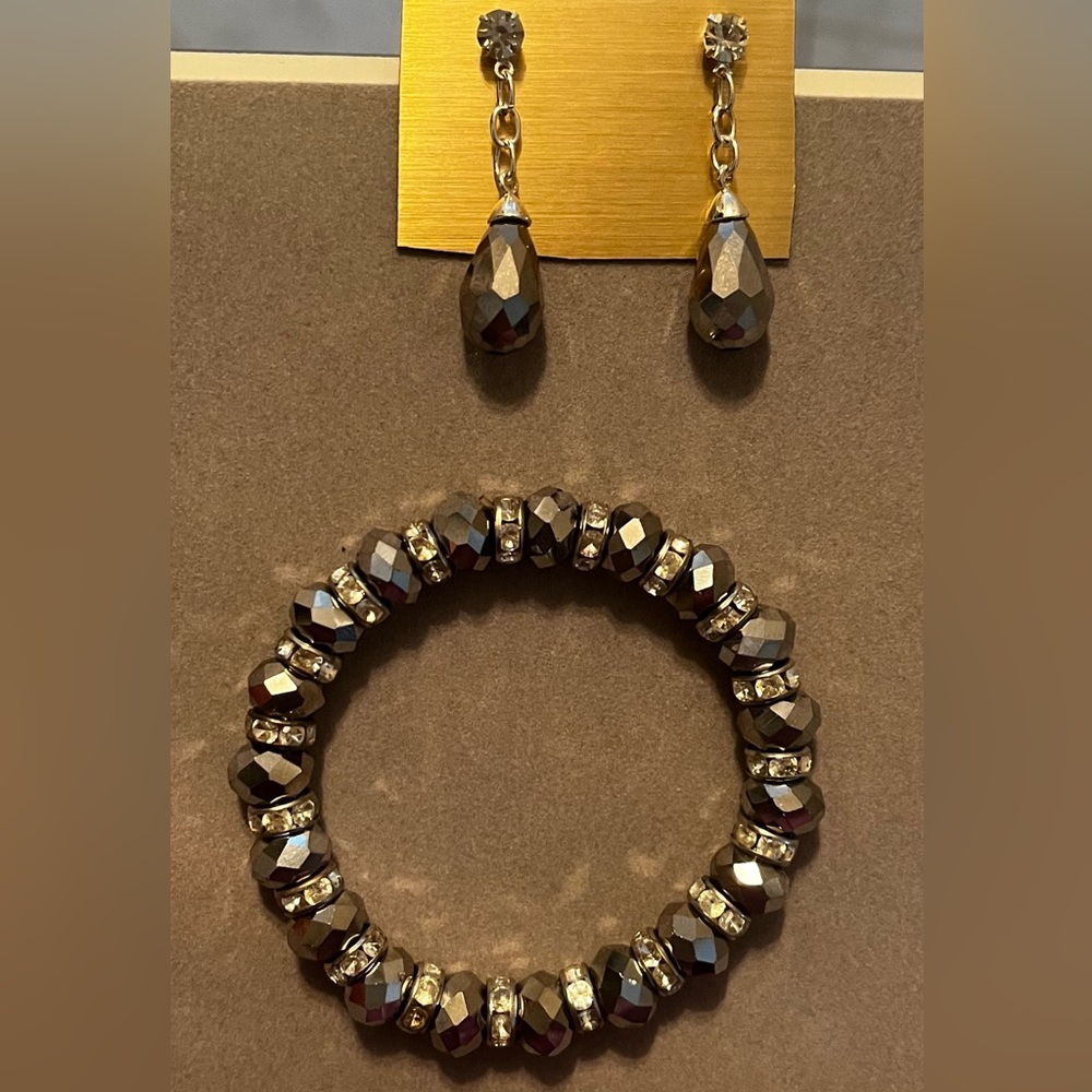 Pewter bracelet and earrings.